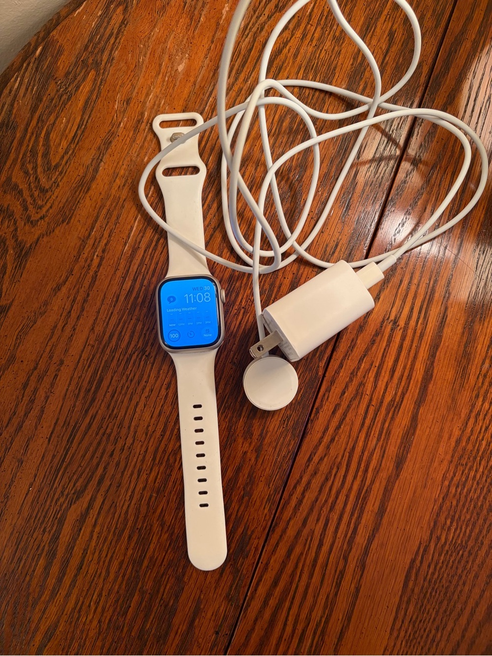 Apple White Smartwatch with Matching White Charger series 9